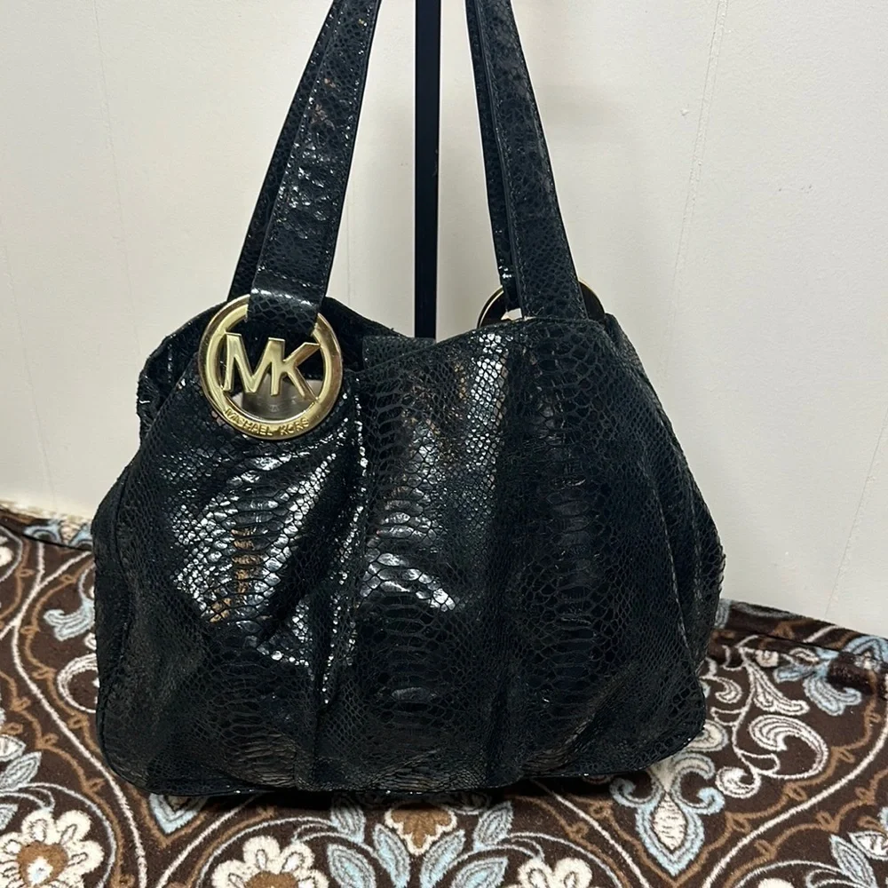 Michael Kors Black Hobo Bag with Gold Emblem
